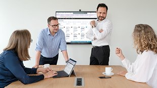 HOWOGE Mitarbeiter beim Meeting 